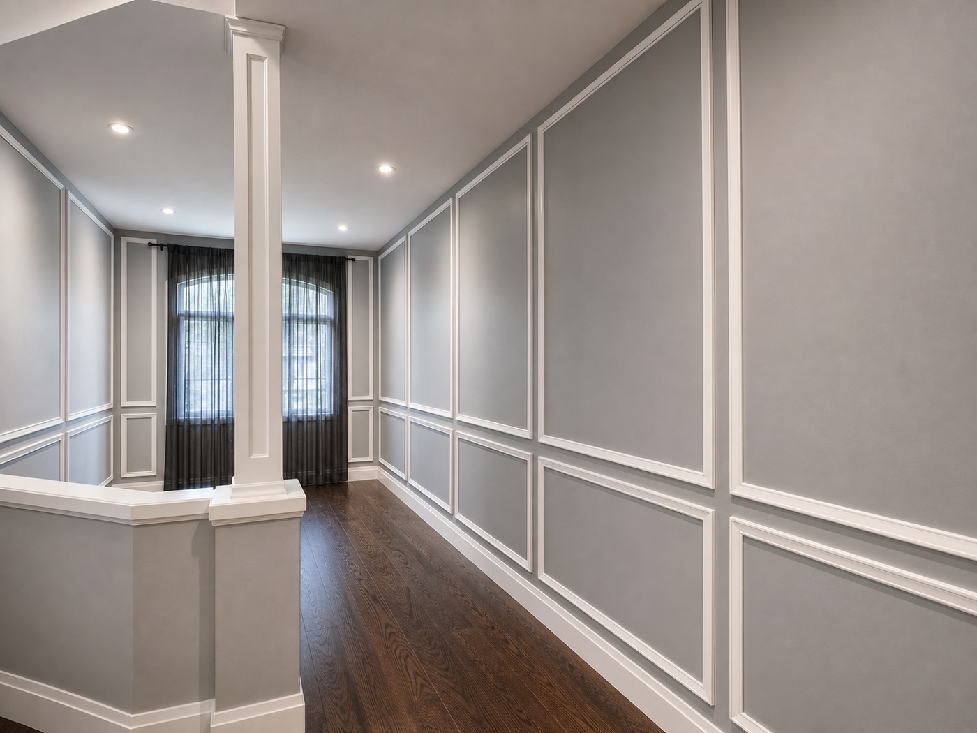 Grey panelled hallway with wainscoting