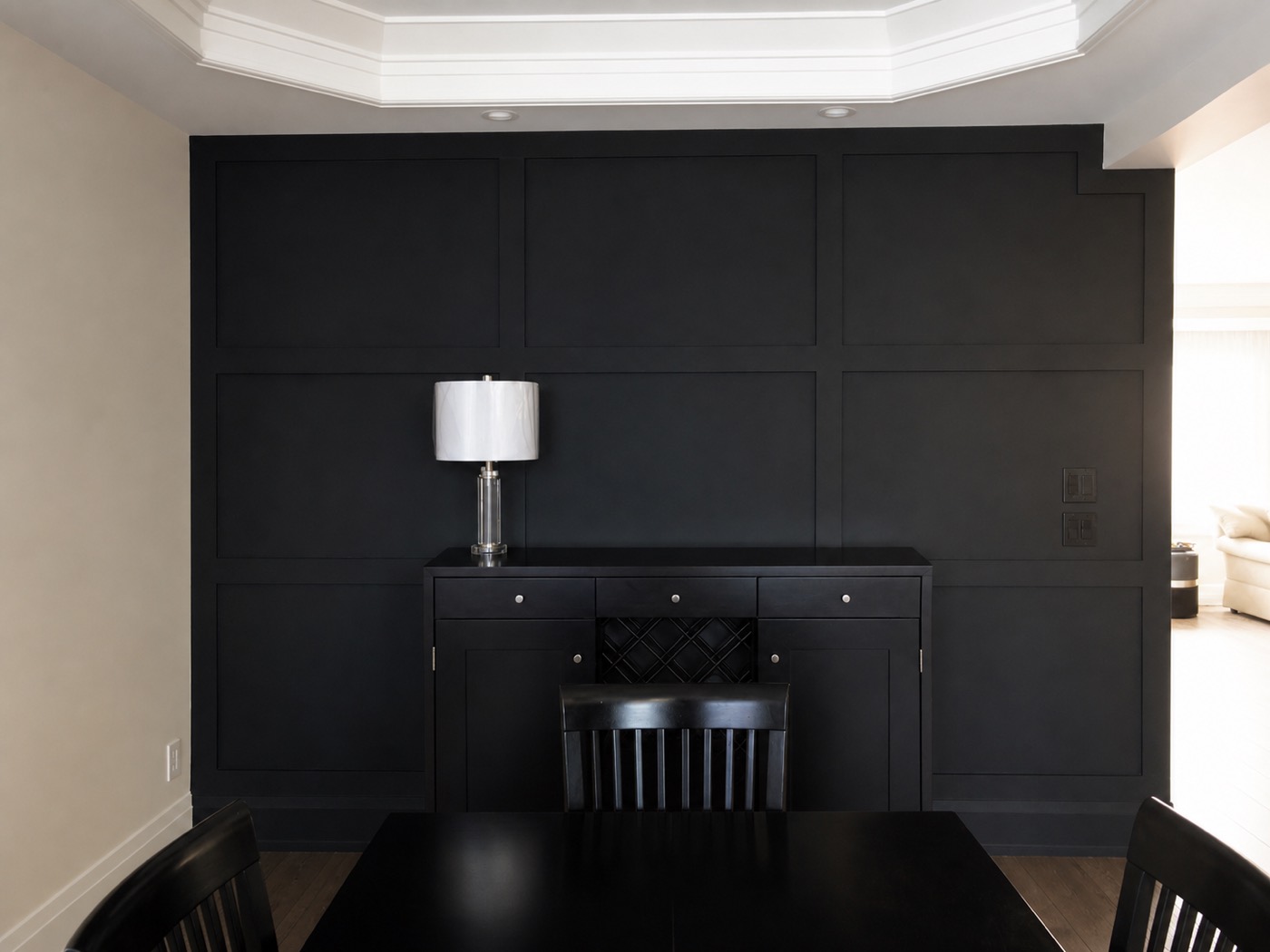 Black panelled dining feature wall