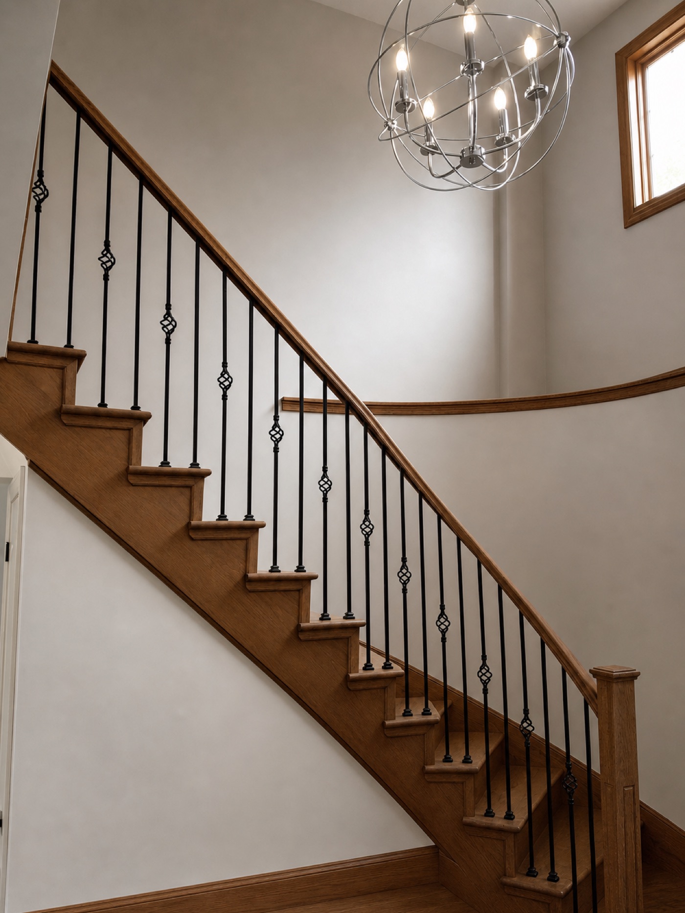 The same stairwell with bare walls before the finish work