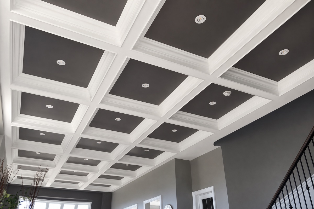 White coffered ceiling grid with recessed lights