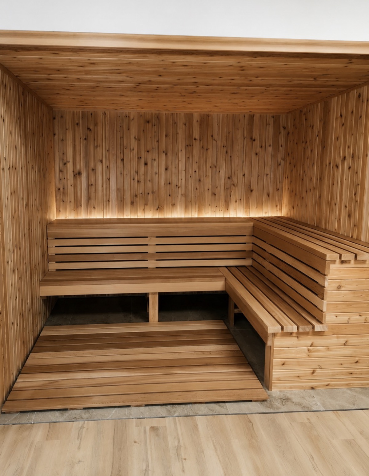 Finished cedar home sauna with tiered benches