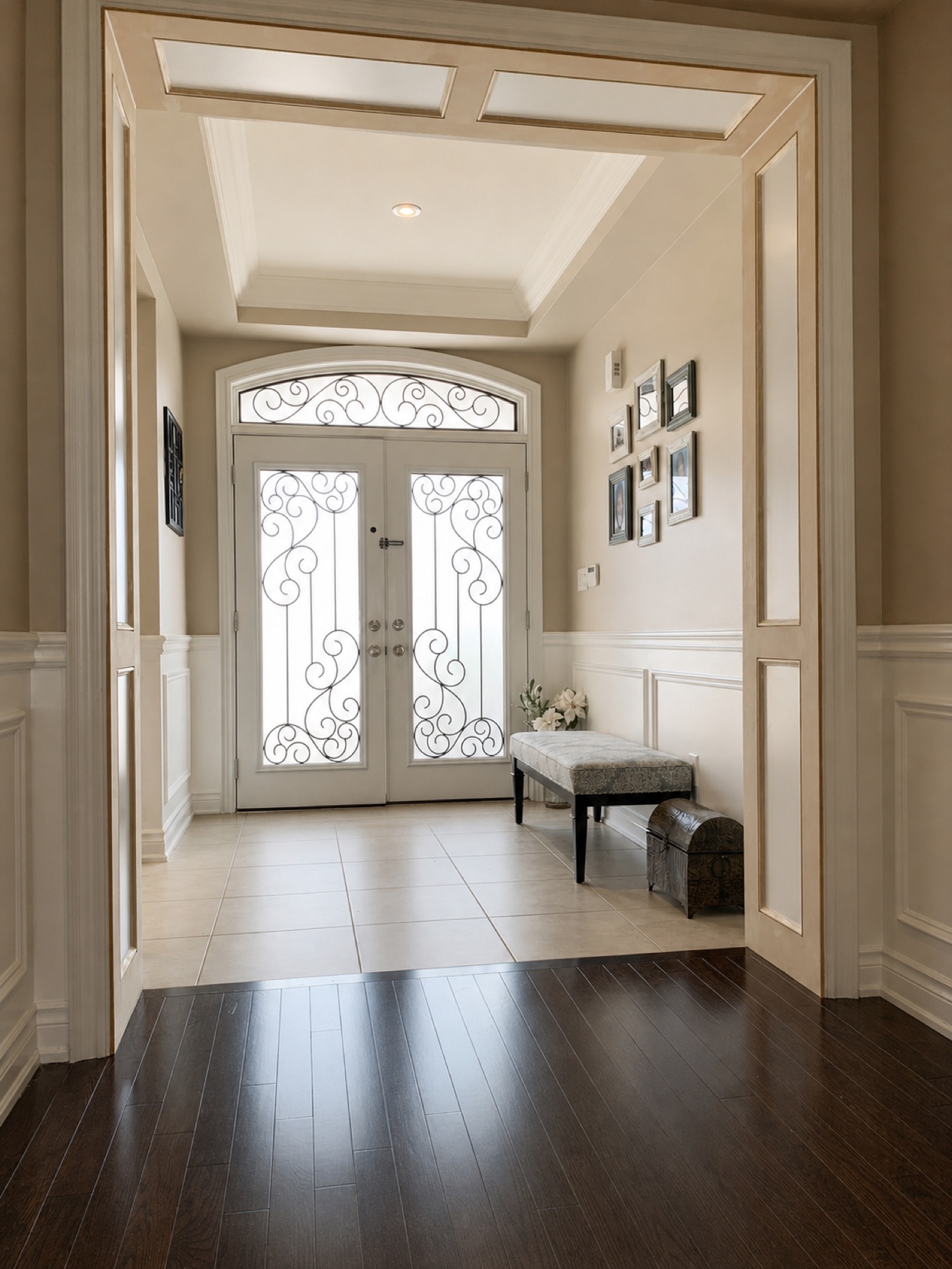 Cased opening around a wrought-iron front door